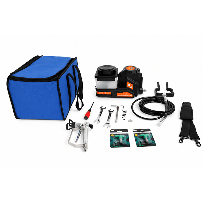 Portable spray-painting kit laid out: blue carrying bag with a cordless airless sprayer, hoses, tips, and accessories